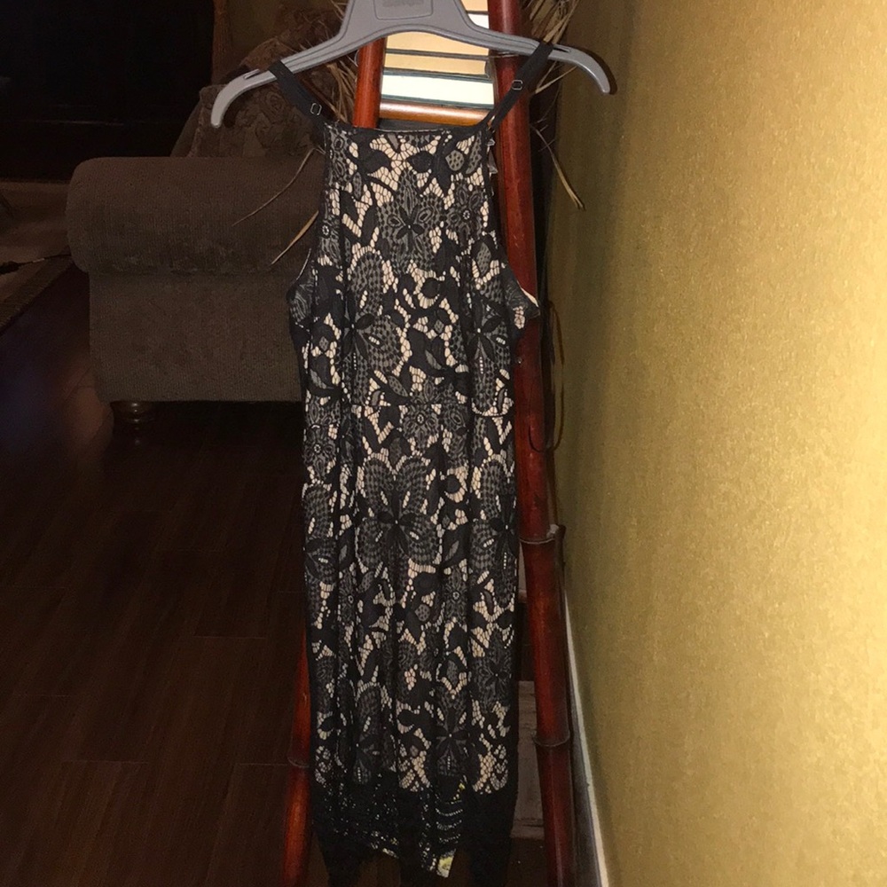 A black & tan laced dress.